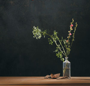 Flower arranging is an easy way to bring wabi-sabi into your décor. Simply arrange seasonally appropriate wild flowers in found objects such as baskets, gourds, old bottles, or rusty cans. Instead of cutting them to make the display perfectly symmetrical, arrange them to reflect their relative heights and natural disposition. To be truly wabi-sabi, the arrangement should include an odd number of flowers, and the stems should not be crowded.